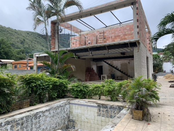 construá∆o de casa com piscina